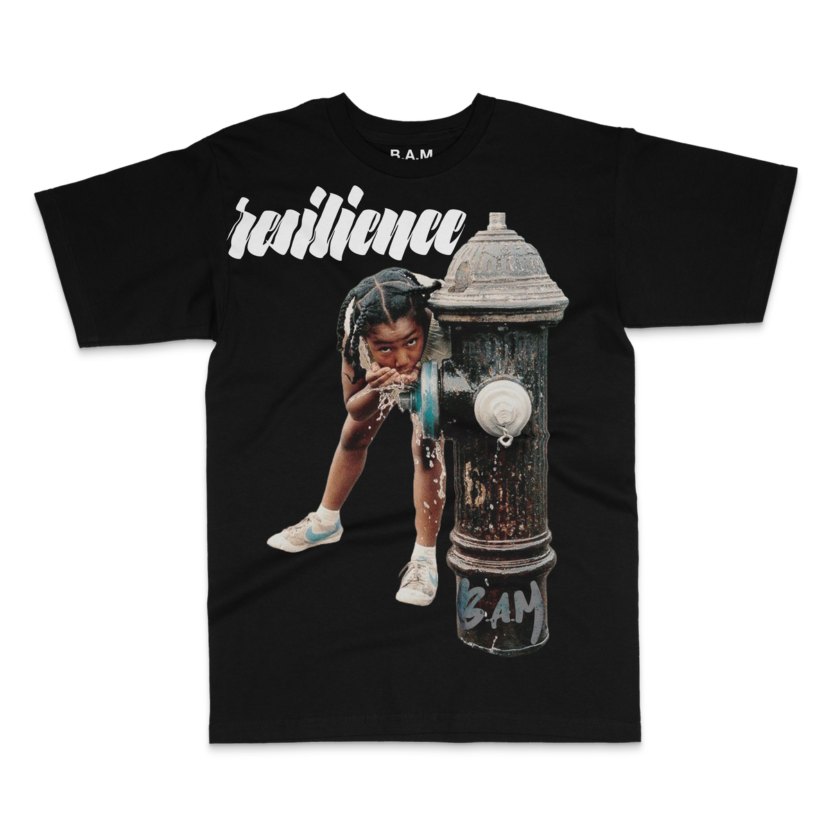 Black tee with photo of a girl drinking from a fire hydrant under Resilience script – BY ANY MEANS by 2ManyLookz