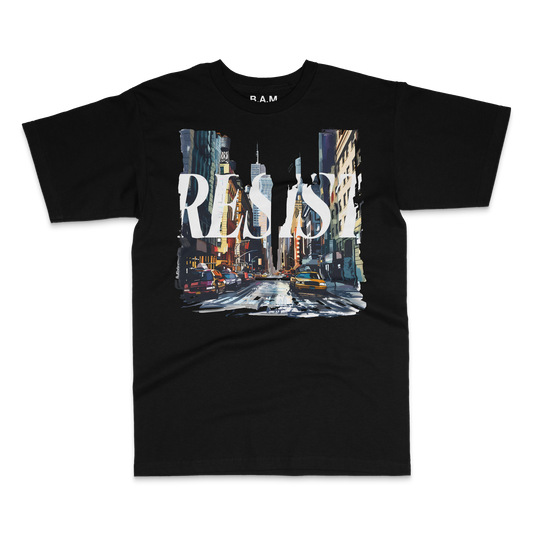 Black tee with distressed RESIST lettering over a painted NYC street with yellow cabs – BY ANY MEANS by 2ManyLookz